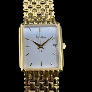 Bulova Gold-Tone Dress Watch with White Dial. New old stock